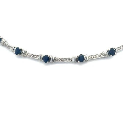 GOLD SAPPHIRE DIAMOND NECKLACE 14K WHITE BAR LINK: GOLD SAPPHIRE DIAMOND NECKLACE 14K WHITE BAR LINK This is an elegant collar necklace, it is crafted from 14k white gold featuring alternating short curved bars with oval frame links, the bars have rou