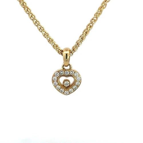 CHOPARD HAPPY DIAMOND GOLD NECKLACE 18K YELLOW FLOATING HEART PENDANT: This lovely necklace is by Chopard from the Happy Diamond Collection, it is a stunning piece of fine jewelry featuring a heart pendant with diamond bezel around a double side glass case with one bezel