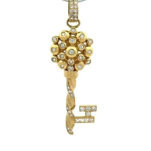 LARGE 18K YELLOW GOLD DIAMOND FLORAL KEY PENDANT: LARGE 18K YELLOW GOLD DIAMOND FLORAL KEY PENDANT This is an impressive key pendant, it is crafted from 18k yellow gold featuring the top with assorted size beads joined together in an open circle styl