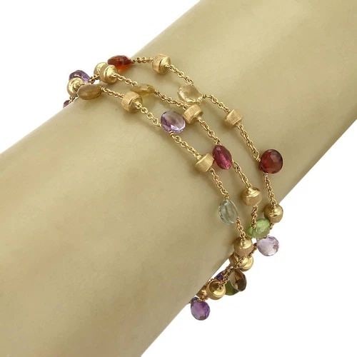 MARCO BICEGO PARADISE MULTICOLOR GEMS 18K YELLOW GOLD TRIPLE STRAND BRACELET: MARCO BICEGO PARADISE MULTICOLOR GEMS 18K YELLOW GOLD TRIPLE STRAND BRACELET Marco Bicego PARADISE Multicolor Gems 18k Yellow Gold Triple Strand Bracelet This gorgeous triple strand bracelet is by Mar