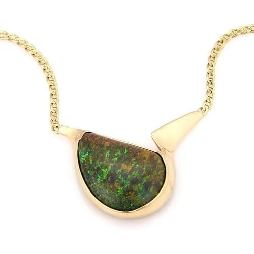 GOLD SUGAR OPAL PENDANT 23.5CT ESTATE 14K YELLOW MARINER LINK NECKLACE: GOLD SUGAR OPAL PENDANT 23.5CT ESTATE 14K YELLOW MARINER LINK NECKLACE This is a stunning Estate Necklace , crafted in 14kt yellow gold with a large odd shape magnificent sugar opal and cased around w