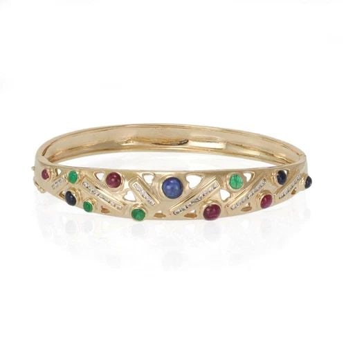 BRACELET DIAMOND & GEMS 14K YELLOW GOLD OPEN DESIGN BANGLE ESTATE: BRACELET DIAMOND & GEMS 14K YELLOW GOLD OPEN DESIGN BANGLE ESTATE This 14k yellow gold bracelet features round-cut diamonds and gemstones in an open design bangle style. The natural white diamonds are