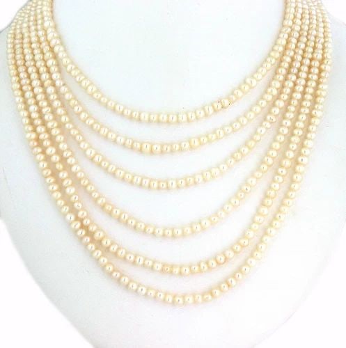 PEARLS MULTI-STRAND GOLD NECKLACE 18K YELLOW LAYERED LONG STRANDS: PEARLS MULTI-STRAND GOLD NECKLACE 18K YELLOW LAYERED LONG STRANDS This beautiful long vintage necklace features a 32 inches long 6 strands pearl necklace, there are 2 open style 18k yellow gold rings,