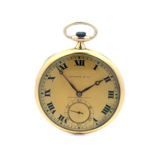 TIFFANY & CO. GOLD POCKET WATCH OPEN FACE 8K BY TOUCHON & CO.: TIFFANY & CO. GOLD POCKET WATCH OPEN FACE 8K BY TOUCHON & CO. The 70620 Touchon & Co. Open Face Pocket Watch is made for Tiffany & Co. It is a luxurious timepiece made of 18k yellow gold. The watch fe
