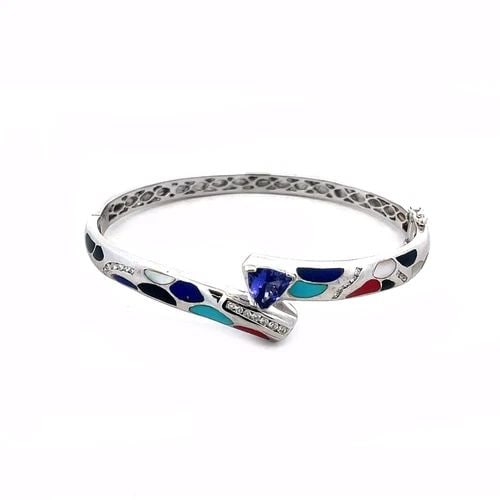 DIAMOND TANZANITE GOLD BRACELET 14K WHITE INLAY HINGE BANGLE: DIAMOND TANZANITE GOLD BRACELET 14K WHITE INLAY HINGE BANGLE This is a contemporary bracelet, it is crafted from 18k white gold, it is hinged on one side with push lock on the other side. The front of