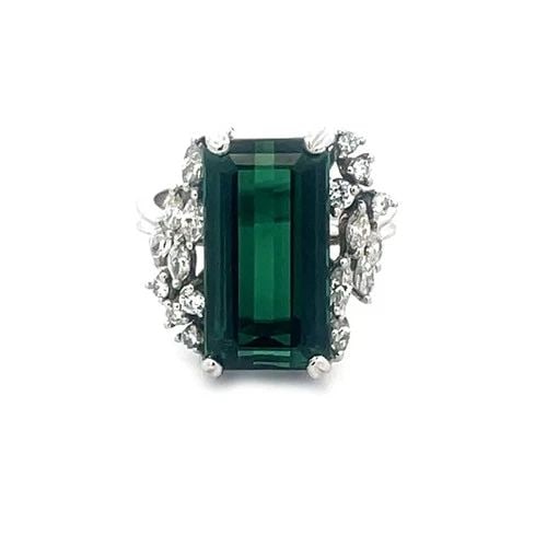 TOURMALINE DIAMOND GOLD RING 14-16K WHITE RECTANGLE TOP COCKTAIL STYLE: TOURMALINE DIAMOND GOLD RING 14-16K WHITE RECTANGLE TOP COCKTAIL STYLE The gorgeous cocktail ring is a stunning piece of fine jewelry that features a rectangular top with a stunning dark green tourmal