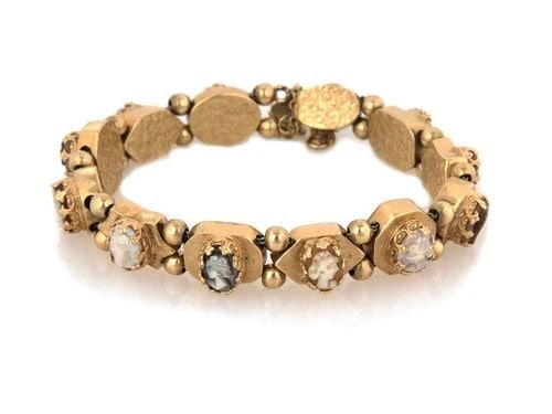 14 CAMEO SLIDE BRACELET MOTHER OF PEARL SHELL GOLD ASSORTED SHAPE LINK: 14 CAMEO SLIDE BRACELET MOTHER OF PEARL SHELL GOLD ASSORTED SHAPE LINK Vintage Mother of Pearl Shell Cameo 14k Gold Assorted Shape Link Bracelet Description This lovely oval carved cameos with double 