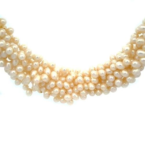 TIFFANY & CO. PICASSO 18K YELLOW GOLD 8 STRANDS TORSADE PEARLS NECKLACE: TIFFANY & CO. PICASSO 18K YELLOW GOLD 8 STRANDS TORSADE PEARLS NECKLACE This is a fashionable style authentic torsade pearl necklace from Tiffany & Co. by Paloma Picasso. The ring hook clasp on each e