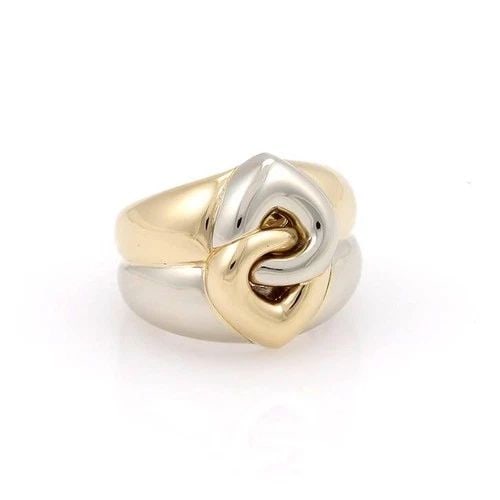 BVLGARI GOLD HEARTS RING 18K YELLOW & WHITE INTERLOCKING DESIGN: BVLGARI GOLD HEARTS RING 18K YELLOW & WHITE INTERLOCKING DESIGN The Bvlgari Gold Hearts Ring is a stunning piece of fine jewelry crafted with 18K yellow and white interlocking hearts design in a doubl