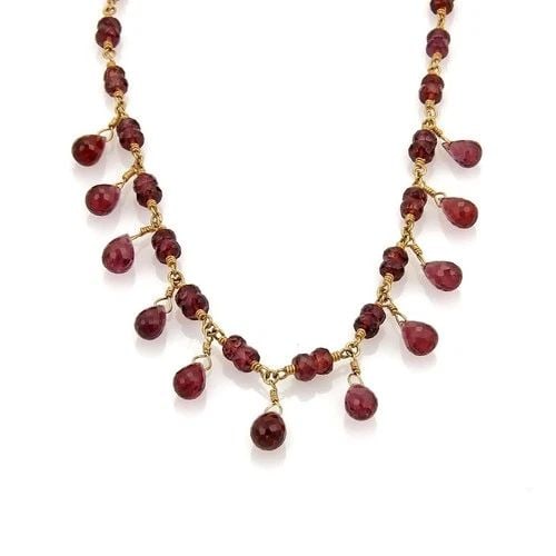 TIFFANY & CO. GARNET GOLD NECKLACE 18K YELLOW DANGLE BEAD TOGGLE CLASP ESTATE: TIFFANY & CO. GARNET GOLD NECKLACE 18K YELLOW DANGLE BEAD TOGGLE CLASP ESTATE This gorgeous necklace is from Tiffany & Co. it is crafted from 18k yellow gold featuring a spiral fine wire link chain st