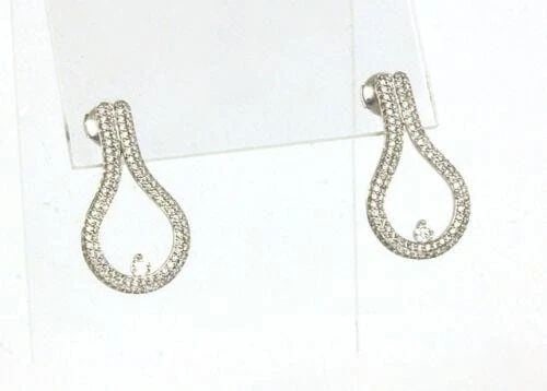 MOVADO DIAMOND GOLD EARRINGS 18K WHITE OPEN LOOP STYLE: MOVADO DIAMOND GOLD EARRINGS 18K WHITE OPEN LOOP STYLE This is an authentic pair of Movado 18k white gold and diamonds ladies drop dress earrings. The pair is well crafted in 18k white gold with a smo