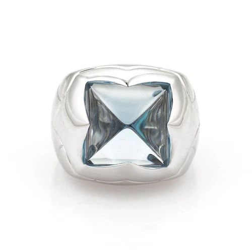 BULGARI RING PIR?MIDE 18K WHITE GOLD FLORAL BLUE GEM RING SIZE 4: BULGARI RING PIR?MIDE 18K WHITE GOLD FLORAL BLUE GEM RING SIZE 4 The Bulgari Ring Pirámide in 18k White Gold with a Blue Gemstone is a stunning piece of fine jewelry from Italy. This dome-style ring 