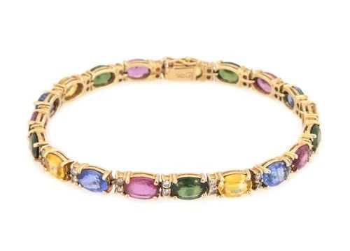 DIAMOND BRACELET WITH MULTICOLOR GEMSTONES 14K YELLOW GOLD OVAL LINK: DIAMOND BRACELET WITH MULTICOLOR GEMSTONES 14K YELLOW GOLD OVAL LINK This Diamond Bracelet with Multicolor Gemstones is a stunning piece of fine jewelry crafted with 14k Yellow Gold. The oval-shaped l