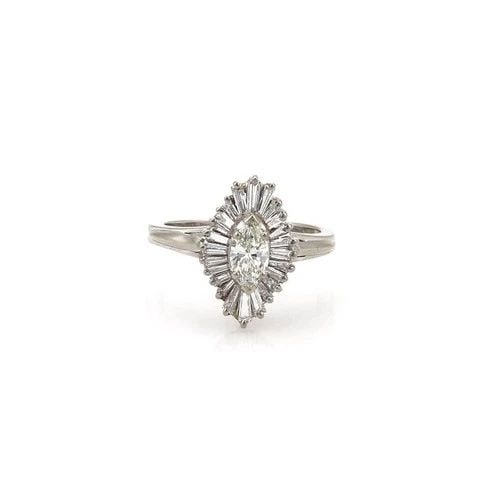 DIAMOND MARQUISE RING WITH BAGUETTES 18K WHITE GOLD COCKTAIL RING SIZE 6.5: DIAMOND MARQUISE RING WITH BAGUETTES 18K WHITE GOLD COCKTAIL RING SIZE 6.5 This Diamond Marquise Ring with Baguettes is a stunning cocktail ring made of 18k white gold. The ring features a natural whi