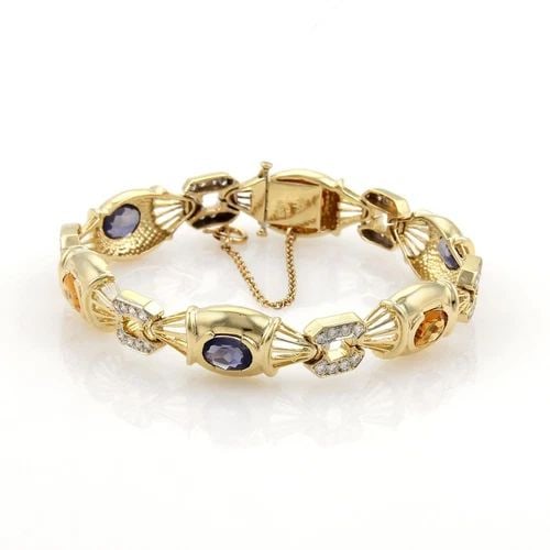 DIAMOND GOLD BRACELET 14K YELLOW GOLD MULTICOLOR GEMS FANCY LINK: DIAMOND GOLD BRACELET 14K YELLOW GOLD MULTICOLOR GEMS FANCY LINK This lovely gold bracelet features a stunning combination of natural white diamonds and multicolor gemstones set in 14k yellow gold. Th