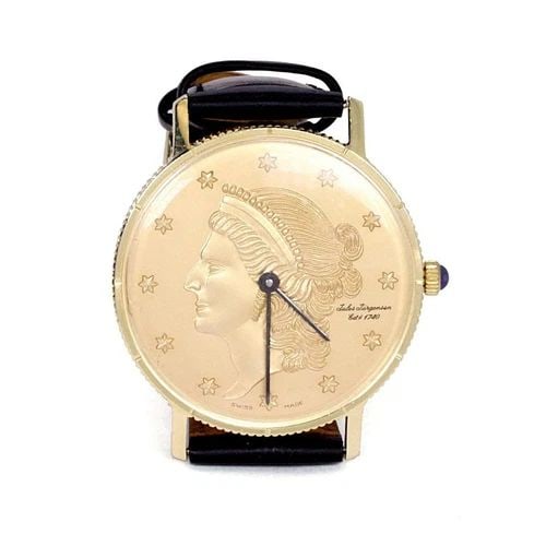 JULES JURGENSEN WATCH MEN'S 14K GOLD COIN HAND WIND LEATHER BAND WRISTWATCH: The Jules Jurgensen Men's 14k Gold Coin Hand Wind Leather Band Wristwatch is a classic and stylish timepiece designed for adult men. This Swiss-made wristwatch features a black dial with a 12-hour ind