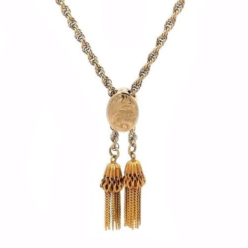 VINTAGE SLIDER LONG TASSEL NECKLACE 14K YELLOW GOLD ROPE CHAIN: VINTAGE SLIDER LONG TASSEL NECKLACE 14K YELLOW GOLD ROPE CHAIN This is a lovely vintage tassel necklace, it is crafted from 14k yellow gold featuring a rope chain with an oval slide box with floral et