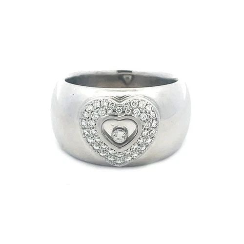70985 CHOPARD HAPPY DIAMOND GOLD RING 18K WHITE HEART WIDE DOME BAND: 70985 CHOPARD HAPPY DIAMOND GOLD RING 18K WHITE HEART WIDE DOME BAND This lovely Chopard dome band diamond ring is a charming piece of fine jewelry featuring pave diamond set heart-shaped frame set in