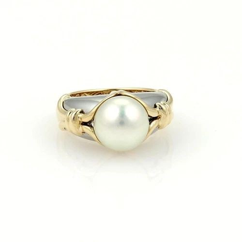 BULGARI PEARL GOLD RING 18K YELLOW & WHITE FANCY DOME SHANK: BULGARI PEARL GOLD RING 18K YELLOW & WHITE FANCY DOME SHANK This lovely ring is by Bulgari; it is a luxurious piece of fine jewelry featuring a stunning Akoya pearl set in 18k yellow and white multi-t