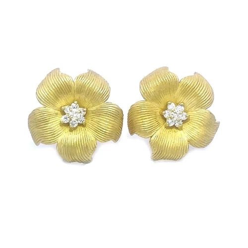 DIAMOND GOLD FLOWER EARRINGS 18K YELLOW DOGWOOD POST CLIP STYLE: This lovely pair of earrings are crafted from 18k yellow gold earrings featuring a beautiful dogwood flower design with a cluster of natural white diamonds set in the center of the flower. The petals 