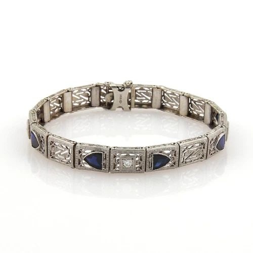 ART DECO DIAMONDS GOLD BRACELET 14K WHITE FILIGREE RECTANGLE LINKS: ART DECO DIAMONDS GOLD BRACELET 14K WHITE FILIGREE RECTANGLE LINKS This Art Deco Diamonds Gold Bracelet features a stunning design with rectangular white gold links adorned with intricate filigree det