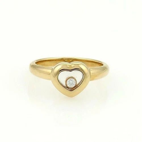 CHOPARD RING HAPPY DIAMOND 18K YELLOW GOLD HEART SIZE 7.25 W /CERT: CHOPARD RING HAPPY DIAMOND 18K YELLOW GOLD HEART SIZE 7.25 W /CERT The Chopard Ring Happy Diamond in 18k Yellow Gold is a luxurious and elegant piece of fine jewelry. This size 7.25 ring features a ro