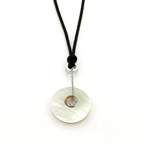 CHOPARD HAPPY DIAMOND MOTHER OF PEARL FLORAL CIRCLE 18K TWO TONE PENDANT: CHOPARD HAPPY DIAMOND MOTHER OF PEARL FLORAL CIRCLE 18K TWO TONE PENDANT The Chopard Happy Diamond Mother of Pearl Floral Circle 18k Two Tone Pendant is a stunning necklace featuring a circle shape pe