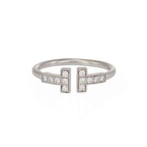 TIFFANY T COLLECTION DIAMOND 18K WHITE GOLD WIRE CUFF BAND RING SIZE 9.25: TIFFANY T COLLECTION DIAMOND 18K WHITE GOLD WIRE CUFF BAND RING SIZE 9.25 Tiffany T Collection Diamond 18k White Gold Wire Cuff Band Ring Size 9.25 Description Tiffany T for Two, this charming and ele