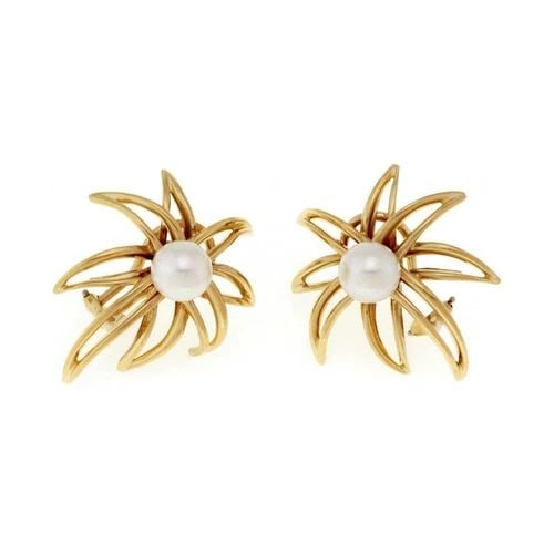 TIFFANY & CO.1994 FIREWORKS PEARLS 18K YELLOW GOLD CLIP ON HUGGIE EARRINGS: TIFFANY & CO.1994 FIREWORKS PEARLS 18K YELLOW GOLD CLIP ON HUGGIE EARRINGS Tiffany & Co.1994 Fireworks Pearls 18k Yellow Gold Clip On Huggie Earrings Description These chic and stylish authentic pair 
