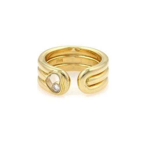 CHOPARD HAPPY DIAMOND GOLD CUFF BAND 18K YELLOW HEART STACK STYLE SIZE 5: CHOPARD HAPPY DIAMOND GOLD CUFF BAND 18K YELLOW HEART STACK STYLE SIZE 5 The Chopard Happy Diamond gold band is an elegant and luxurious ring made of 18k yellow gold. It features a cuff band with trip