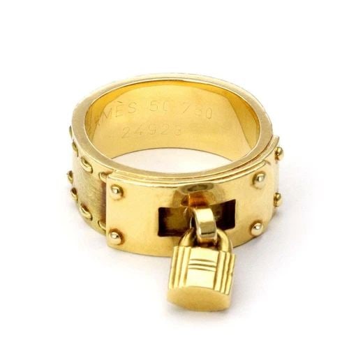 HERMES H PADLOCK DROP CHARM BAND RING IN 18K YELLOW GOLD SIZE 5: HERMES H PADLOCK DROP CHARM BAND RING IN 18K YELLOW GOLD SIZE 5 Hermes H Padlock Drop Charm Band Ring in 18k Yellow Gold Size 5 Description This charming authentic padlock ring is by Hermes, it is cra