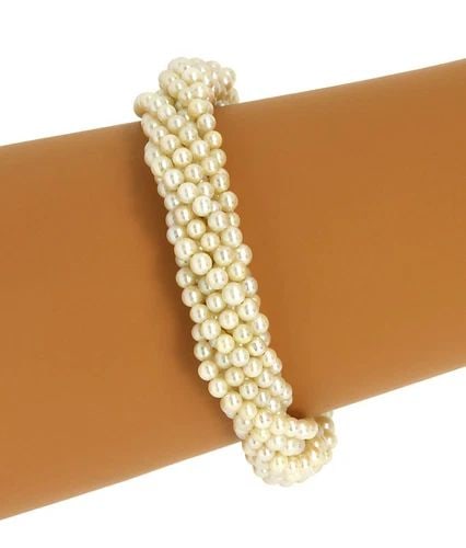 PEARLS & ENAMEL 18K BRACELET VINTAGE MULTI-STRAND YELLOW GOLD: PEARLS & ENAMEL 18K BRACELET VINTAGE MULTI-STRAND YELLOW GOLD This vintage multi-strand yellow gold bracelet features lustrous rich cream-colored pearls with enamel accents, creating a unique and eleg