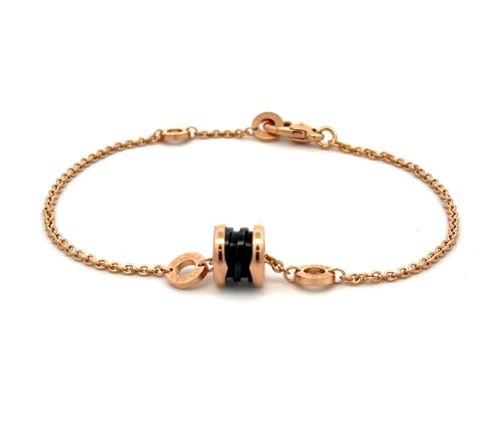 BULGARI B. ZERO1 CERAMIC MINI SPIRAL CHARM 18K ROSE GOLD CHAIN BRACELET CERT: BULGARI B. ZERO1 CERAMIC MINI SPIRAL CHARM 18K ROSE GOLD CHAIN BRACELET CERT From the B.Zero1 Collection this lovely authentic Bvlgari bracelet is finely crafted from 18k rose gold with a polished fea