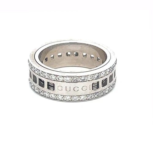 GUCCI DIAMOND SPINNING GOLD BAND 18K WHITE ETERNITY 6: GUCCI DIAMOND SPINNING GOLD BAND 18K WHITE ETERNITY 6 This is a beautiful eternity band by Gucci from the Spinning Collection. It is crafted from18k white gold with a polished finish. The 7mm wide ban
