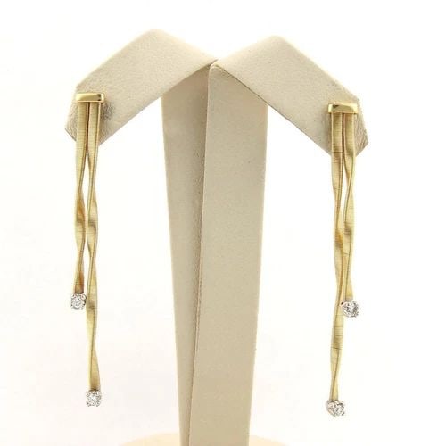 MARCO BICEGO DIAMONDS GOLD EARRINGS 18K YELLOW DOUBLE STRAND DANGLE STYLE: MARCO BICEGO DIAMONDS GOLD EARRINGS 18K YELLOW DOUBLE STRAND DANGLE STYLE This gorgeous pair of authentic earrings are by renowned designer Marco Bicego, it is well crafted in solid 18kt yellow and wh