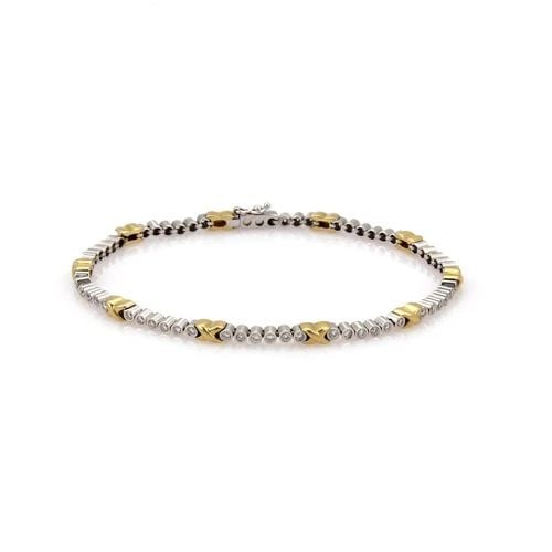 18K YELLOW & WHITE GOLD 1.00CT DIAMOND X LINK TENNIS BRACELET: 18K YELLOW & WHITE GOLD 1.00CT DIAMOND X LINK TENNIS BRACELET 1.00ct Diamond X Link 18k Two Tone Gold Tennis Bracelet Description A fine tennis bracelet forged from 18k white and yellow gold with a hi