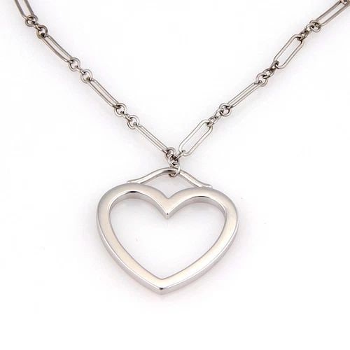 TIFFANY & CO. GOLD HEART PENDANT 18K WHITE OVAL LINK CHAIN: TIFFANY & CO. GOLD HEART PENDANT 18K WHITE OVAL LINK CHAIN The Tiffany & Co. Gold Heart Pendant is a luxurious and elegant piece of fine jewelry. Made from 18k white gold, this pendant features a clas