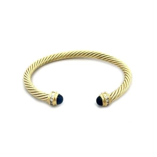 DAVID YURMAN DIAMOND GOLD CUFF BRACELET GEMSTONE CABLE BAND: DAVID YURMAN DIAMOND GOLD CUFF BRACELET GEMSTONE CABLE BAND This is an elegant cuff bracelet by David Yurman from the Cable Classics Collection. It is a luxurious and elegant piece of fine jewelry. wi