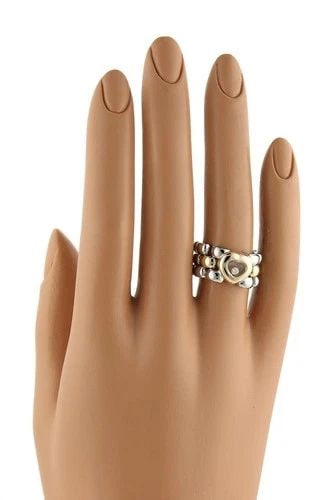 CHOPARD HAPPY DIAMOND RING 18K GOLD & STEEL PANTHER LINK FLEX BAND SIZE 6: CHOPARD HAPPY DIAMOND RING 18K GOLD & STEEL PANTHER LINK FLEX BAND SIZE 6 This authentic Chopard Panther link flex ring is finely crafted from 18k yellow and stainless steel in a fine polished finish.