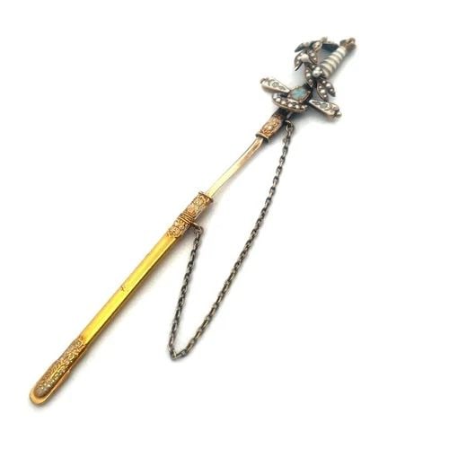 VICTORIAN 22K & 14K GOLD SWORD STICK PIN SEED PEARLS ENAMEL CROSS HANDLE: This is an eye-catching Victorian long sword stick pin or tie clasp, it is crafted from 22k and 14k yellow gold featuring a Cross handle with white and blue handle. From the crown style top to the end