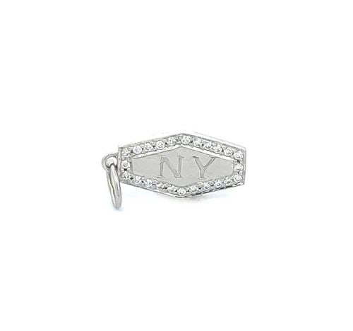 TIFFANY & CO. NY CHARM PENDANT DIAMOND PLATINUM SIGN: TIFFANY & CO. NY CHARM PENDANT DIAMOND PLATINUM SIGN This elegant authentic charm is from Tiffany & Co. It is crafted from platinum with a polished finish featuring a long board like shape with NY eng