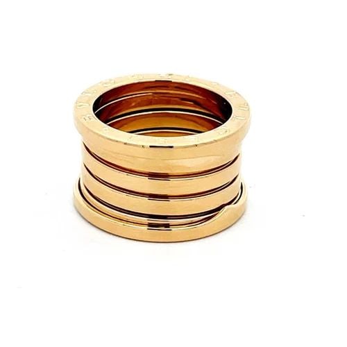 BVLGARI B.ZERO 1 WIDE 18K YELLOW GOLD 4 ROW SPIRAL BAND RING SIZE 5.75: BVLGARI B.ZERO 1 WIDE 18K YELLOW GOLD 4 ROW SPIRAL BAND RING SIZE 5.75 This chic authentic Bulgari wide band ring is finely crafted from 18k yellow gold. It comes from Bvlgari popular B. Zero 1 Collec