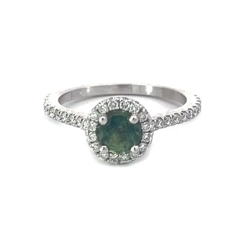ALEXANDRITE DIAMOND GOLD RING 14K WHITE SOLITAIRE W/HALO: ALEXANDRITE DIAMOND GOLD RING 14K WHITE SOLITAIRE W/HALO This is a beautiful solitaire alexandrite with accent ring, it is crafted from 14k white gold featuring a green alexandrite gemstone in the cen