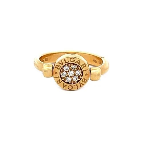 BULGARI DIAMOND FLIP RING 18K YELLOW GOLD ENGRAVED CIRCLE SIZE 6.5: BULGARI DIAMOND FLIP RING 18K YELLOW GOLD ENGRAVED CIRCLE SIZE 6.5 This elegant authentic ring is by Bulgari, it is crafted from18k yellow gold featuring a 3mm wide band with a circle disc strung on a