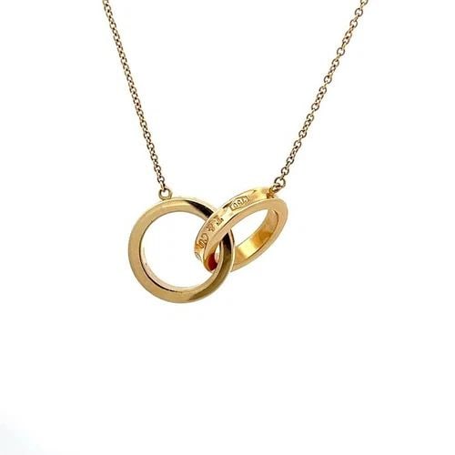 TIFFANY & CO. 1837 RING PENDANT COLLECTION 18K YELLOW GOLD NECKLACE: TIFFANY & CO. 1837 RING PENDANT COLLECTION 18K YELLOW GOLD NECKLACE This is an authentic pendant and chain by Tiffany & Co. from the 1837 Collection. From 18k yellow gold with a polished finish, the p