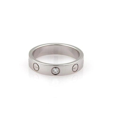 CARTIER LOVE DIAMOND RING 18K WHITE GOLD SMALL MODEL SIZE EU 48-US 4: CARTIER LOVE DIAMOND RING 18K WHITE GOLD SMALL MODEL SIZE EU 48-US 4 The Cartier Love Diamond Ring is a stunning piece of fine jewelry crafted from 18k white gold. This small model ring features a rou