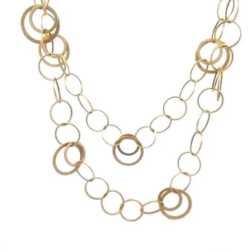 GOLD 14K MULTI-RING NECKLACE YELLOW TEXTURED MOTIFS WIRE RING STYLE 40" LONG: GOLD 14K MULTI-RING NECKLACE YELLOW TEXTURED MOTIFS WIRE RING STYLE 40" LONG The lovely gold multi-ring necklace features a stunning design with double flat ring motifs in yellow textured and chasing 