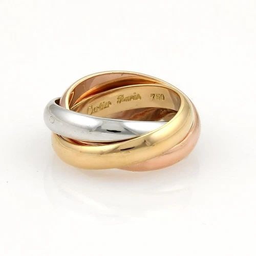 CARTIER TRINITY PARIS RING 18K TRI-COLOR GOLD 4MM ROLLING BAND EU 47-US 4: CARTIER TRINITY PARIS RING 18K TRI-COLOR GOLD 4MM ROLLING BAND EU 47-US 4 The Cartier Trinity rolling band ring is a lovely piece of fine jewelry made from 18k rose, white and yellow gold with a polis