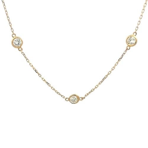 DIAMOND BY THE YARD GOLD NECKLACE 14K YELLOW BEZEL SET STYLE: DIAMOND BY THE YARD GOLD NECKLACE 14K YELLOW BEZEL SET STYLE The product is a stunning 14k yellow gold necklace with a bezel set style featuring a round white diamond in By the Yard Style. The necklac