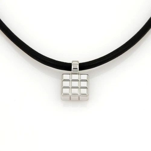 CHOPARD GOLD PENDANT 18K WHITE CUBE STYLE CORD NECKLACE: CHOPARD GOLD PENDANT 18K WHITE CUBE STYLE CORD NECKLACE The Chopard gold pendant and cord necklace is a fine piece of jewelry, the pendant is crafted from 18k white gold featuring a square shape with 